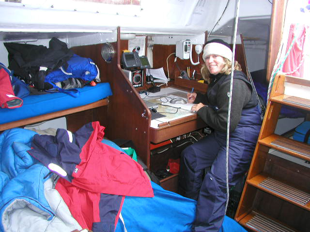Marblehead to Halifax sailing race, Shawna at navigation desk
