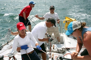 Sailboat racing CHARIAD crew hard at work in Buzzards Bay Regatta