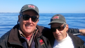 Rick and Herb drifting on CHARIAD, waiting for the wind to pick up, Marblehead, MA