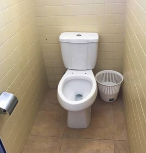 Cuba bathroom toilet with no seat no paper