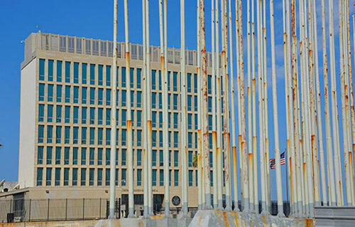 US Embassy Havana Cuba flagpoles photo by CHARIAD Skipper RIck Williams