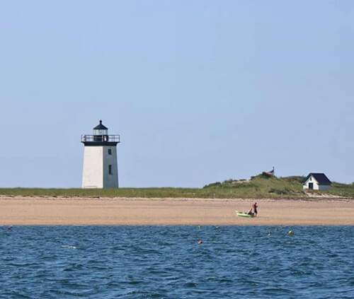 View of P'town lighthouse as CHARIAD leaves harbor