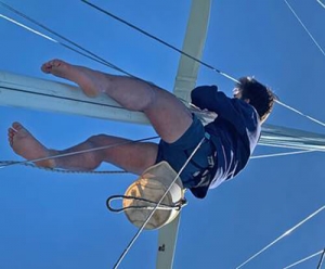 CHARIAD Chris Hardy climbing sailboat mast